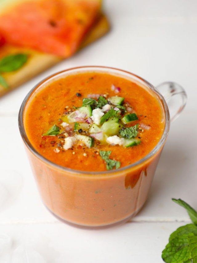 side shot of watermelon gazpacho in a glass mug