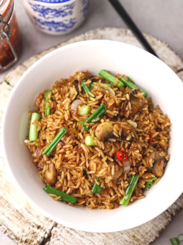 aerial shot of fried rice in a white ceramic bowl