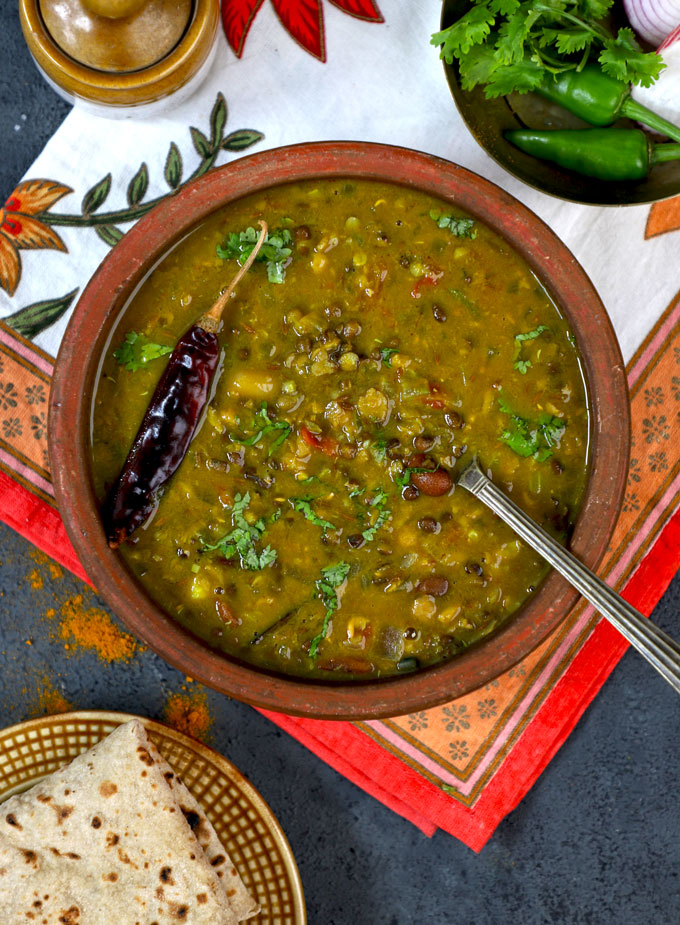 aerial shot of langar wali dal in an earthen pot