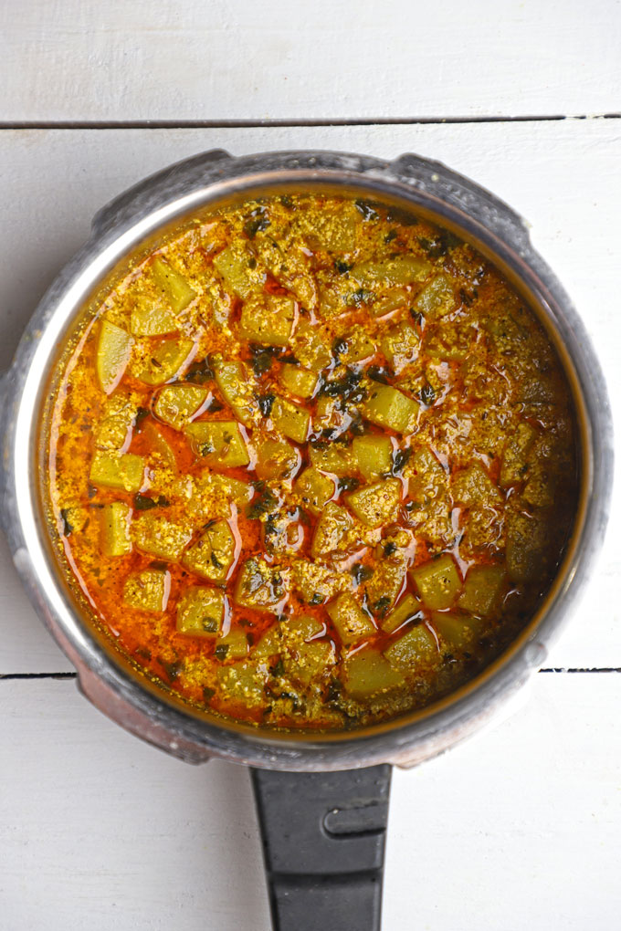 aerial shot of dahi lauki ki sabji in a pressure cooker